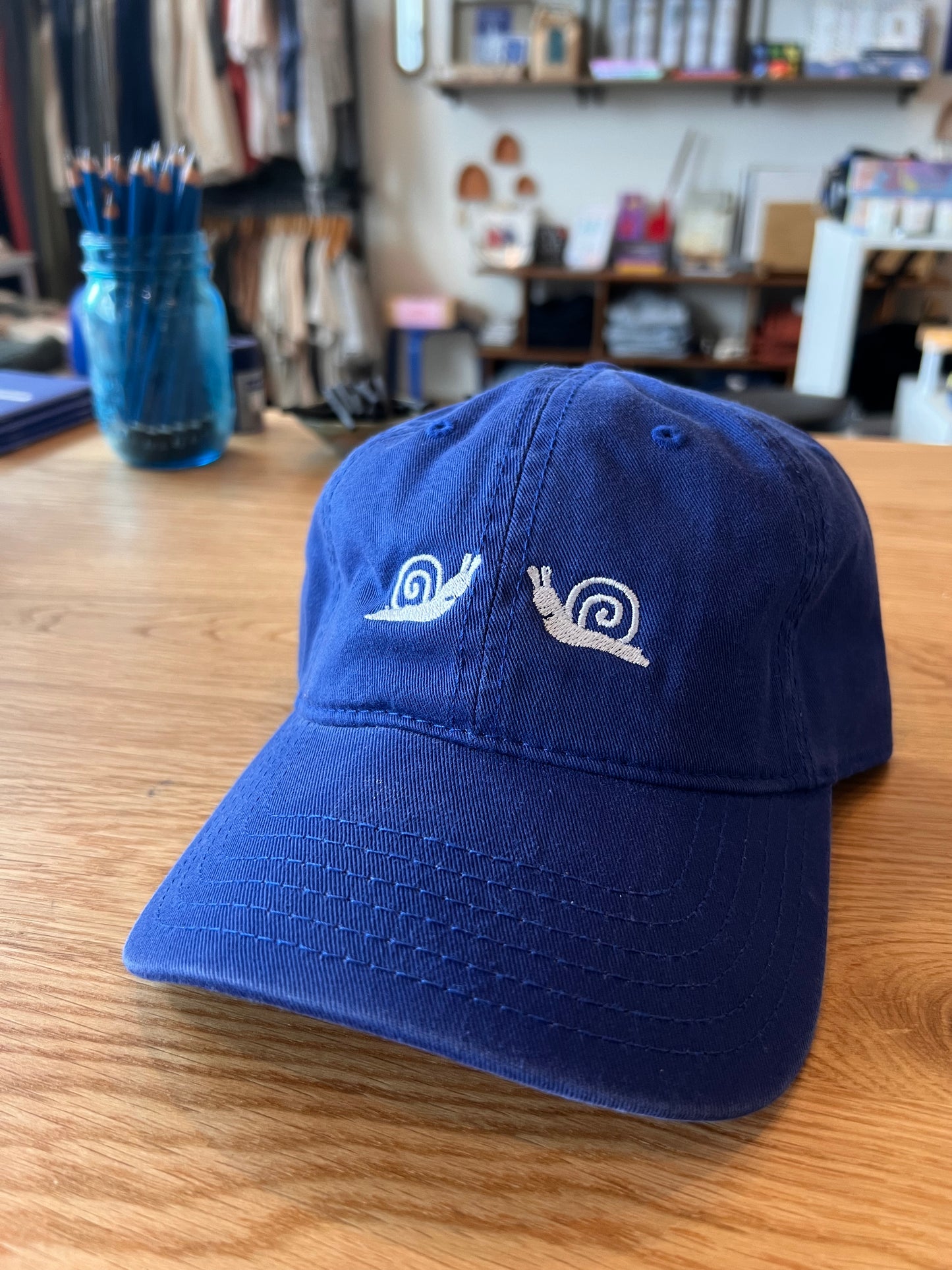 Duality of Snail Dad Cap